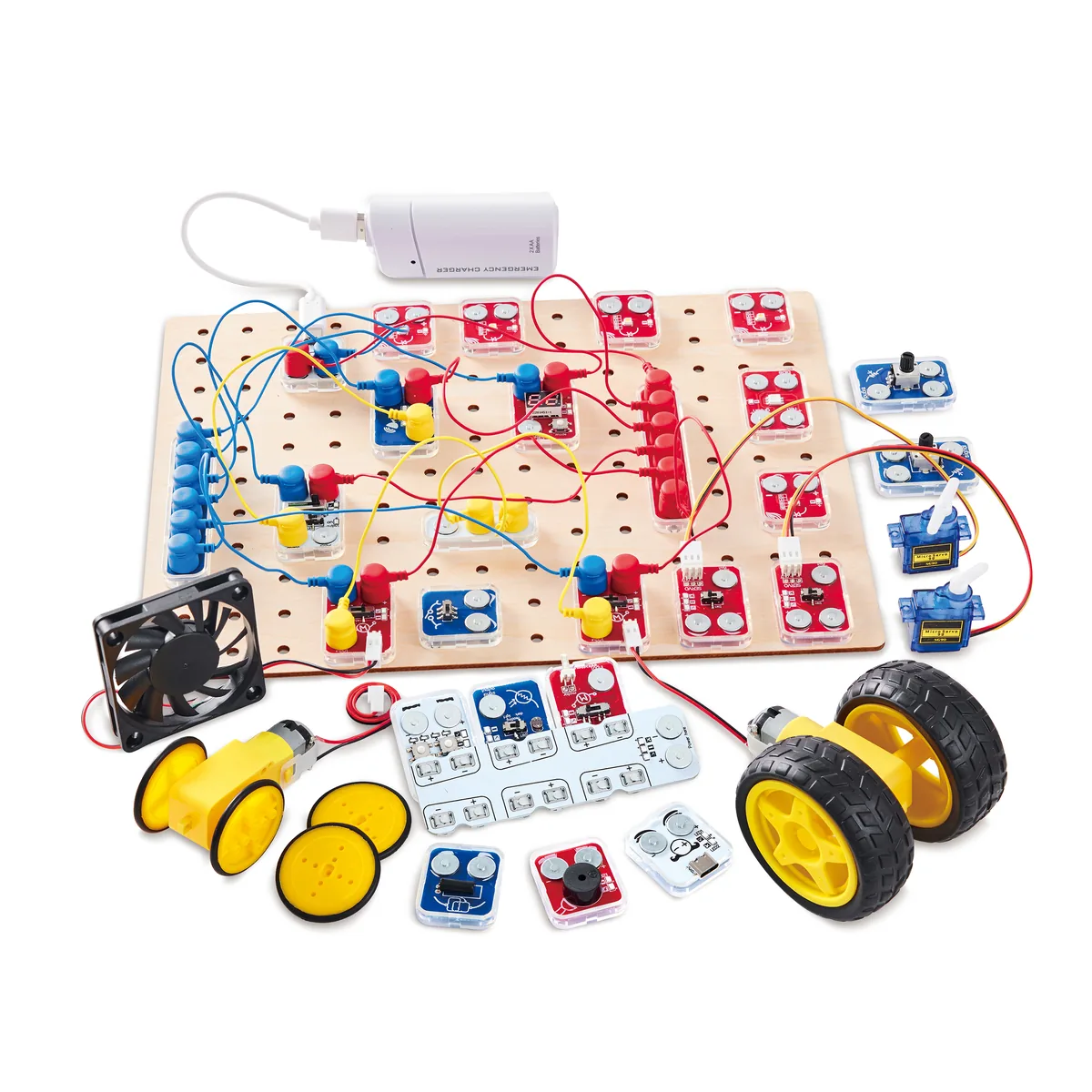 All Lab Kit blocks, wires and wheels laid out on the wooden board