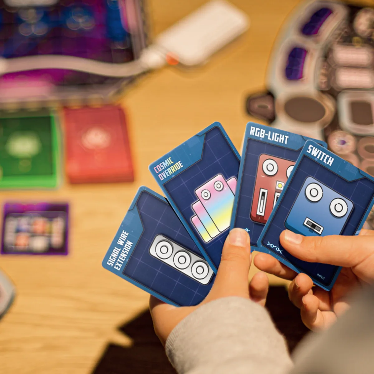 A player holding a hand of Reactor Rescue cards